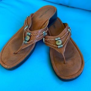 Super Comfy Minnetonka sandals brown leather with silver accents size 10